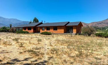 Parcela rebajada con casa en condominio consolidado