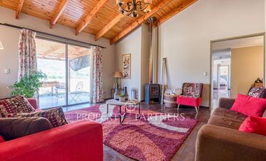 Parcela rebajada con casa en condominio consolidado