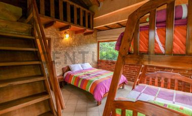 En Venta terreno de 26 hectáreas con hostería en Puerto Quito