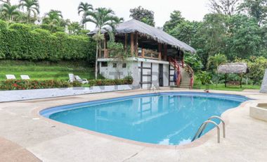 En Venta terreno de 26 hectáreas con hostería en Puerto Quito