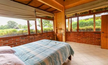 En Venta terreno de 26 hectáreas con hostería en Puerto Quito
