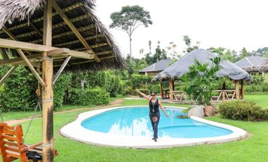 En Venta terreno de 26 hectáreas con hostería en Puerto Quito
