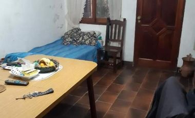Lote de terrero con vivienda