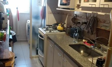Departamento tres ambientes con cochera venta Monte Grande Centro