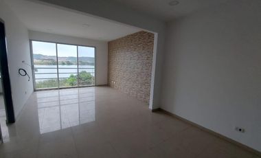 Venta de departamento frente al río en urbanización cerrada