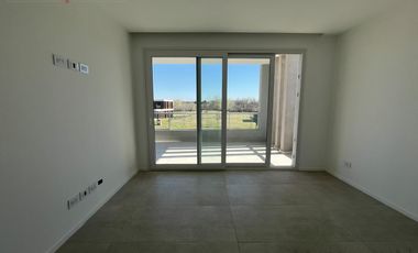Depto 2 ambientes 1er piso a estrenar frente al Golf de Pilará - Mallmann Propiedades