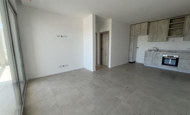 Depto 2 ambientes 1er piso a estrenar frente al Golf de Pilará - Mallmann Propiedades