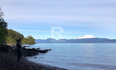 PARCELA 9.500M2 ORILLA CARRETERA CON BORDE LAGO EN CASCADAS