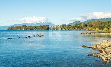PARCELA EN CONDOMINIO CON VISTA VOLCANES Y ACCESO AL LAGO.