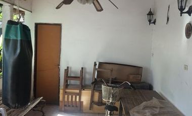 Casa con jardin y quincho