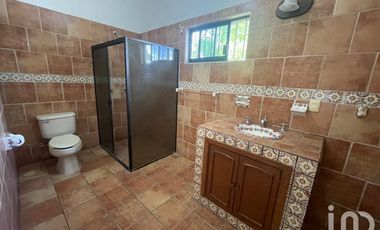 PROPIEDAD EN FRACCIONAMIENTO EN COMALA CON HUERTA/JARDIN