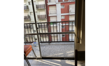 Ambiente externo con balcón