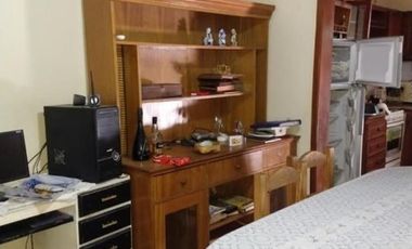 UNA CASA Y DOS DEPARTAMENTOS