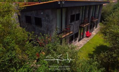 Spectacular house in Valle de Bravo, nest in a lakefront, forest lot sorrounded by natural springs.