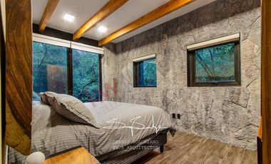 Spectacular house in Valle de Bravo, nest in a lakefront, forest lot sorrounded by natural springs.