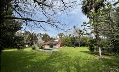 Campo en venta en Ranchos. 1 Ha con casas, pileta, arboleda, etc.