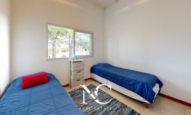 Casa en venta en Costa Esmeralda con fondo libre arbolado
