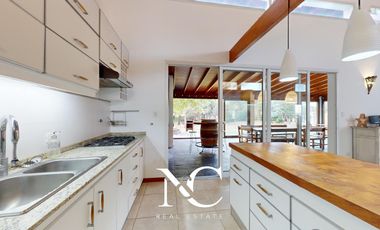 Casa en venta en Costa Esmeralda con fondo libre arbolado
