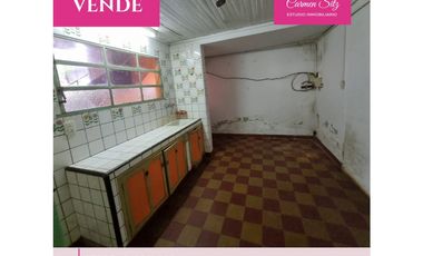 Terreno con casa y deposito a reciclar