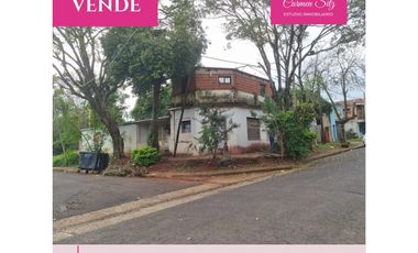 Terreno con casa y deposito a reciclar