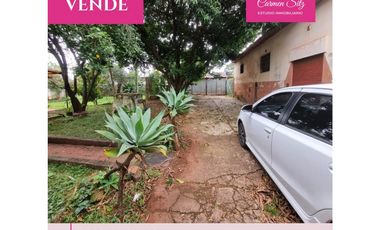 Terreno con casa y deposito a reciclar