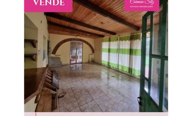 Terreno con casa y deposito a reciclar