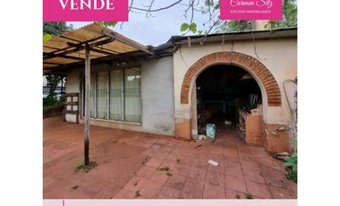 Terreno con casa y deposito a reciclar