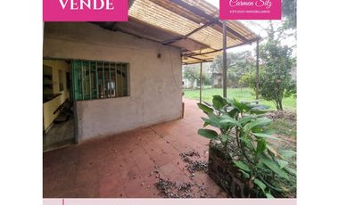 Terreno con casa y deposito a reciclar