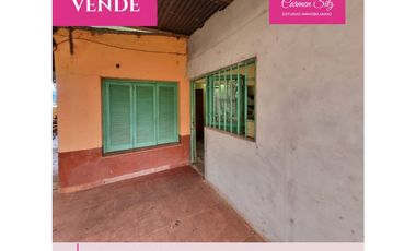 Terreno con casa y deposito a reciclar