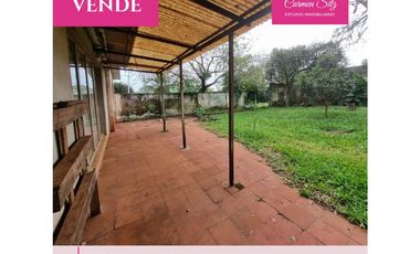 Terreno con casa y deposito a reciclar