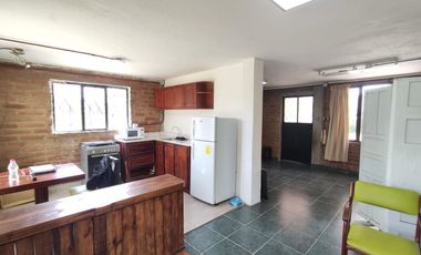 Amplio Terreno en renta de 8700 m²con una suite rustica - Sector Alangasi