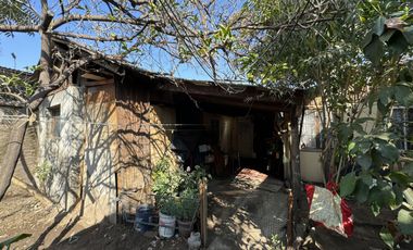 Terreno con 3 Casas de Excelente Potencial Comercial Pob. Malaquías Concha