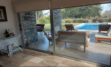 Alquiler temporario. Casa sobre el golf - Golfer's