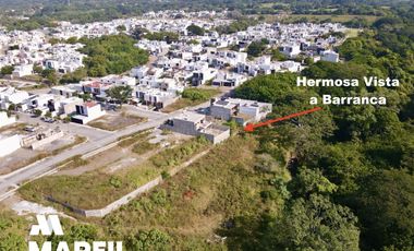Terreno en Venta con Vista Barranca y Bosque en Residencial Albaterra Colima