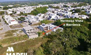 Terreno en Venta con Vista Barranca y Bosque en Residencial Albaterra Colima