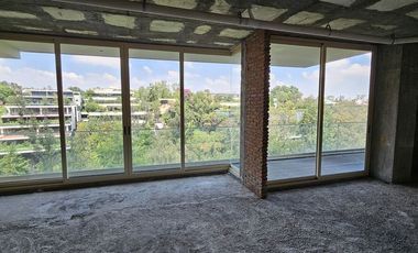 Departamento nuevo en venta con jardín y vista a la cañada en Lomas Altas, CDMX.