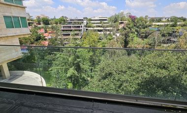 Departamento nuevo en venta con jardín y vista a la cañada en Lomas Altas, CDMX.