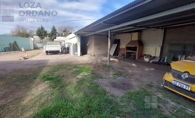 vendo gran terreno con departamento y cocheras
