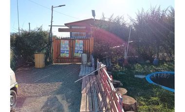 Casa con local comercial
