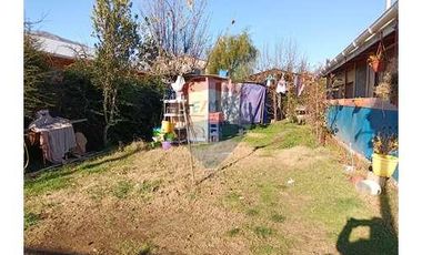 Casa con local comercial