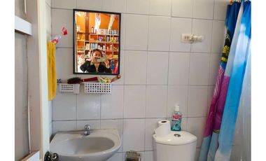 Casa con local comercial