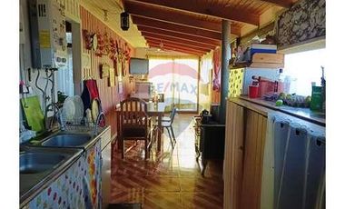 Casa con local comercial
