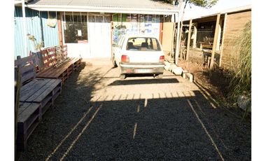Casa con local comercial