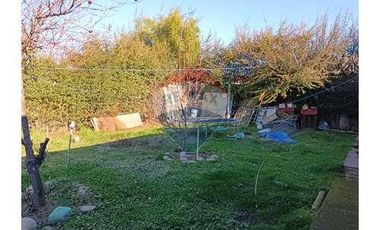 Casa con local comercial
