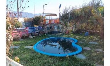 Casa con local comercial