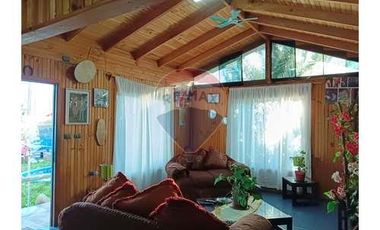 Casa con local comercial