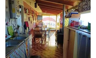 Casa con local comercial
