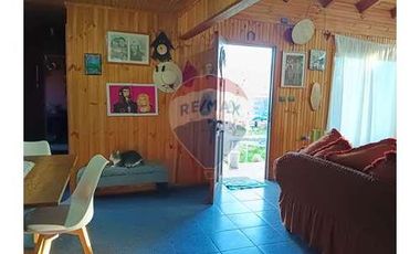 Casa con local comercial