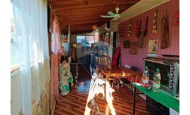 Casa con local comercial