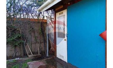 Casa con local comercial